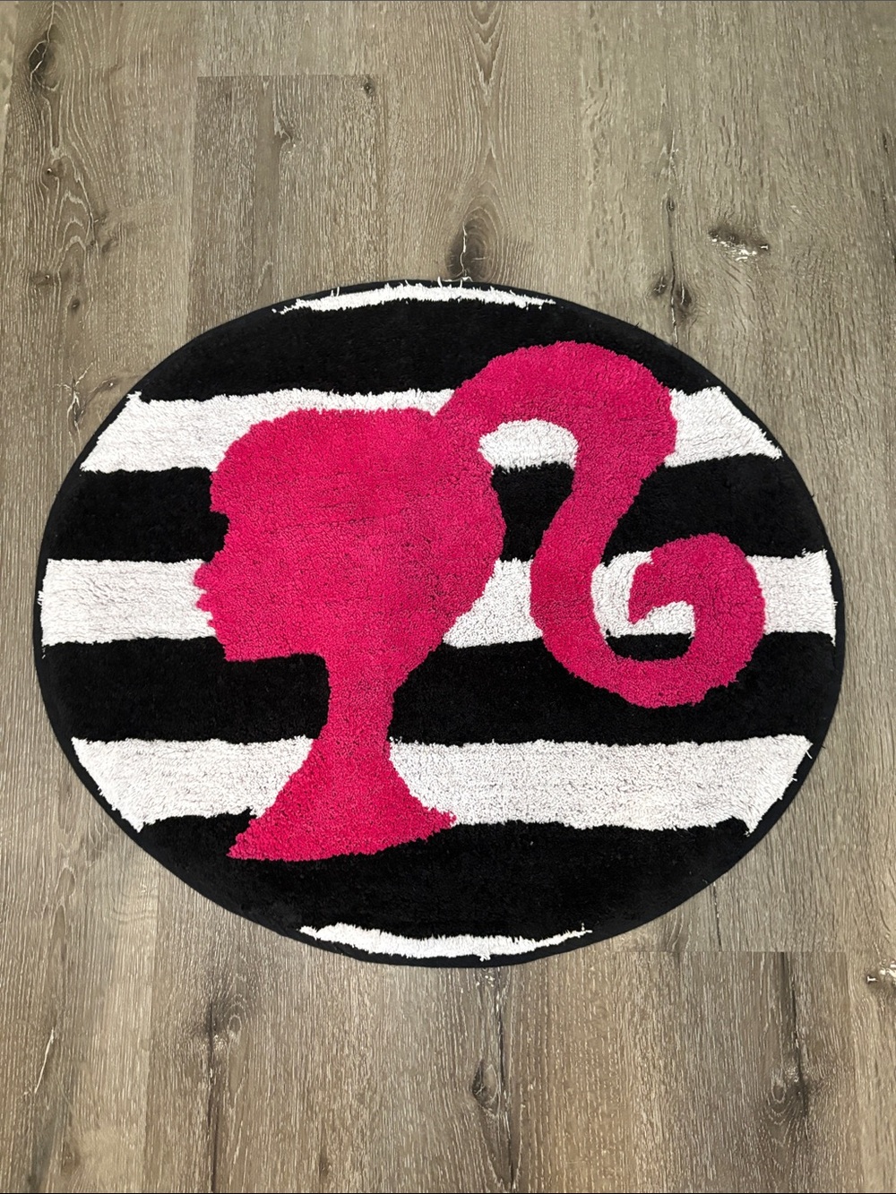 Pink Barbie Profile Round Rug on Black & White Stripes